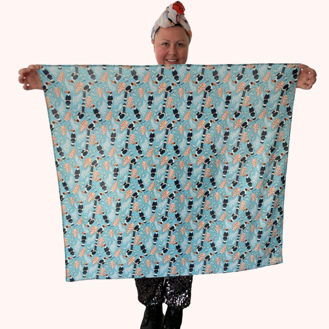 SMD scarf, toucan birds on a birght blue base, full square scarf displayed