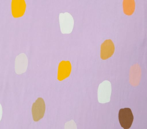 SMD, Lilac base with white, orange and brown coloured spots, close up the Nerida Hansen fabric 