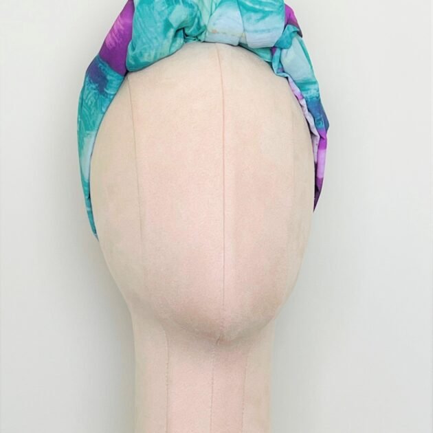 SMD orignal art big splash, a purple heart on turquoise, shown as a knotted head turban. Front View