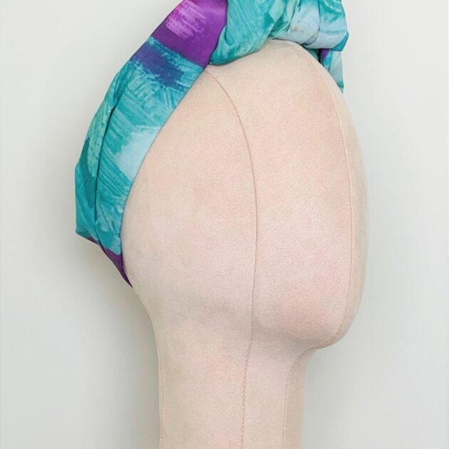 SMD orignal art big splash, a purple heart on turquoise, shown as a knotted head turban. Side View