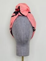 SMD original art 'Hey There', featuring a winking face with red lips on a pink base, displayed as head turban, front view