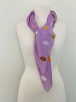 SMD, Lilac base with white, orange and brown coloured spots, displayed as neck scarf