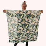 SMD scarf, navy base with a multicoloured floral sea print, full square scarf displayed, print by field day studio