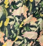 SMD scarf, navy base with a multicoloured floral sea print, close up of fabric