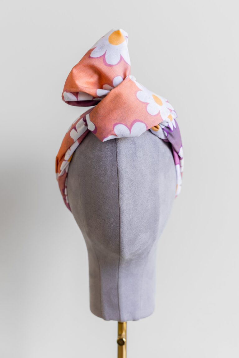 SMD original art 'Oh Daisies', fun white daisy design on a multicoloured base, headscarf with a fan knot, front view