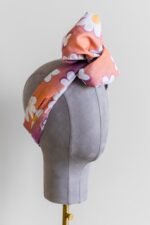 SMD original art 'Oh Daisies', fun white daisy design on a multicoloured base, headscarf with a fan knot, side view