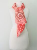 SMD scarf, Emma Stenhouse design in orange, displayed as a neck scarf