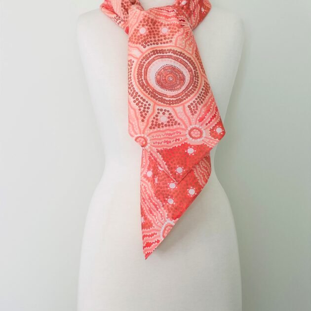 SMD scarf, Emma Stenhouse design in orange, displayed as a neck scarf