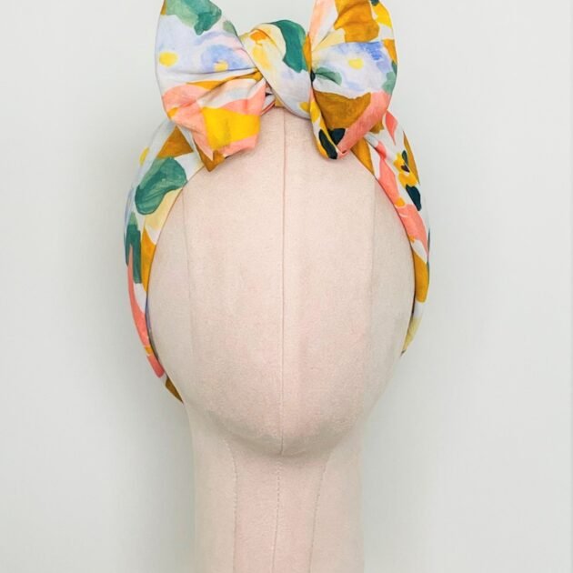 SMD, Pastel floral design, multicoloured, displayed as a headscarf in a large bow, front view