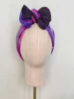 SMD original art 'Protea Party Day', 2 proud purple proteas and purple heart flowers sat in a dark purple frame, shown as a headscarf with bow, front view