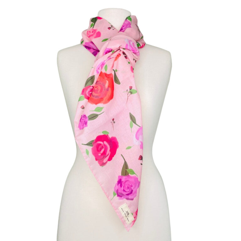 SMD original at 'Roses on Blush', light pink background with pink, red and purple roses. Displayed as a neck scarf.